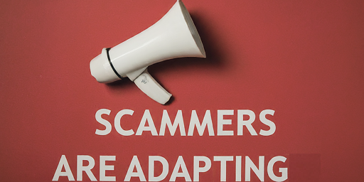 A megaphone against a red background with a cautionary message about scammers adapting to new technologies.